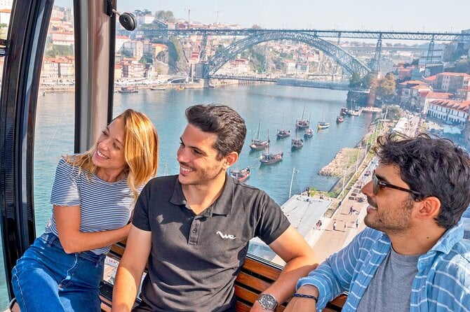 Porto Adventure: Bookshop Discovery, Scenic River Cruise, and Cable Car Challenge — photo 2