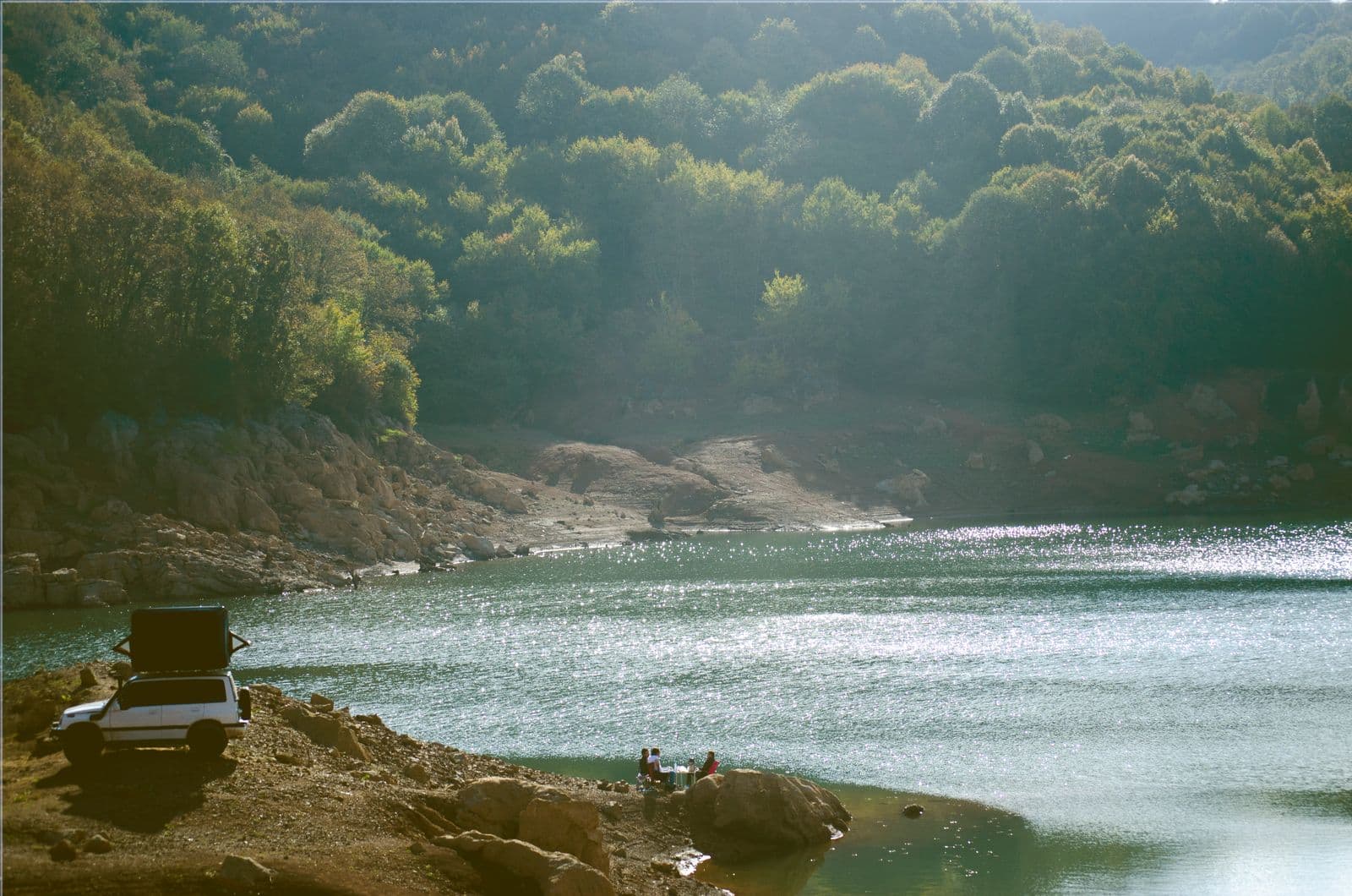 A quiet lakeside camp where a group can stay put and talk