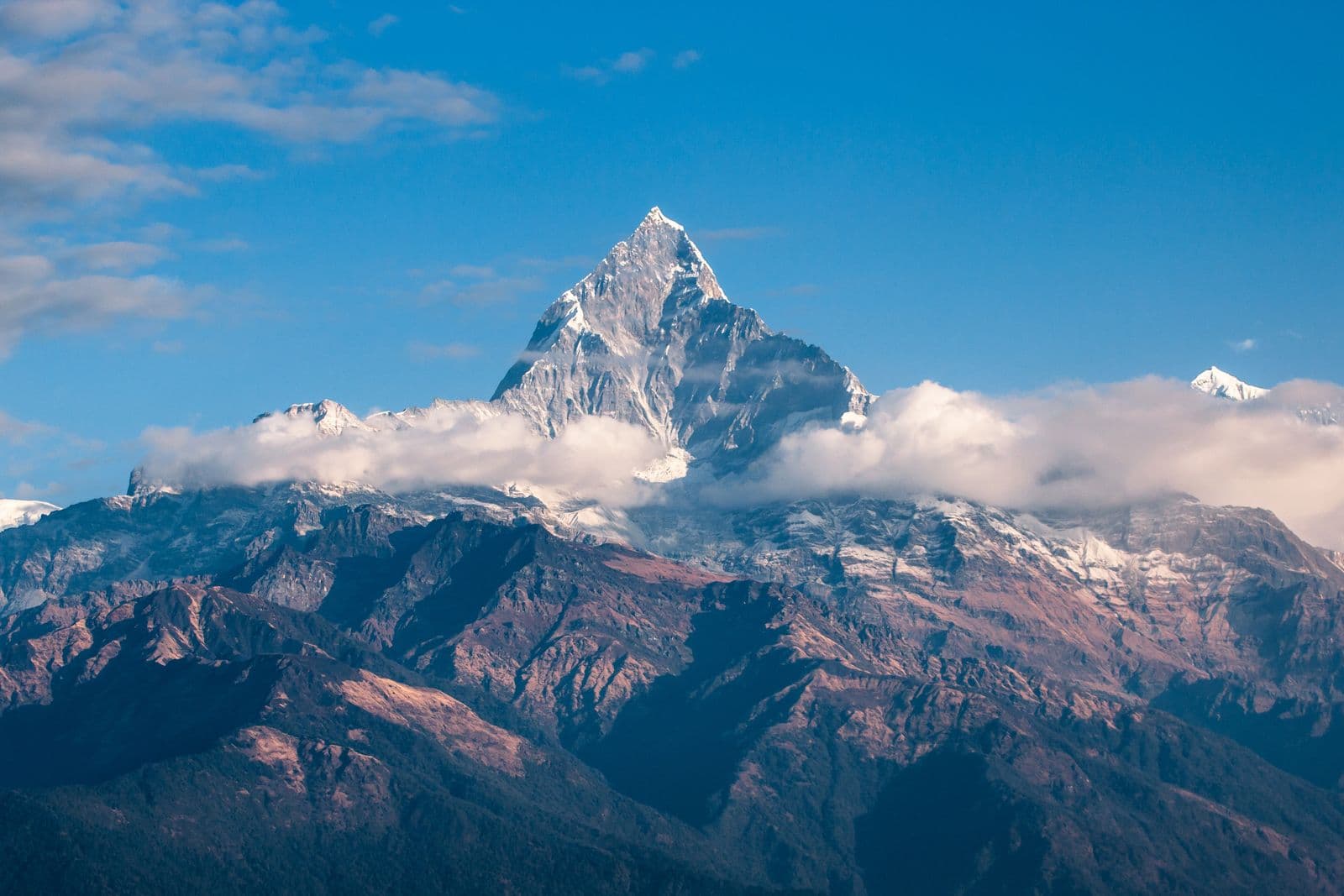 Snow-capped mountain peaks under a clear sky